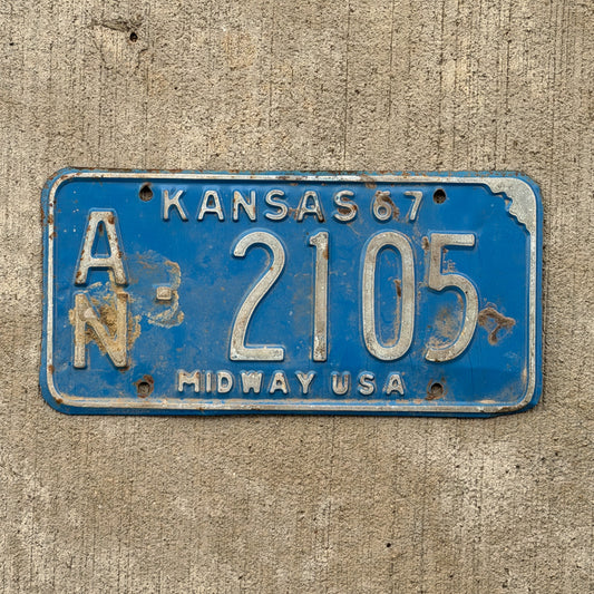 Photo of a 1967 Kansas License Plate Auto Tag Garage Decor Vintage AN 2105 with original patina