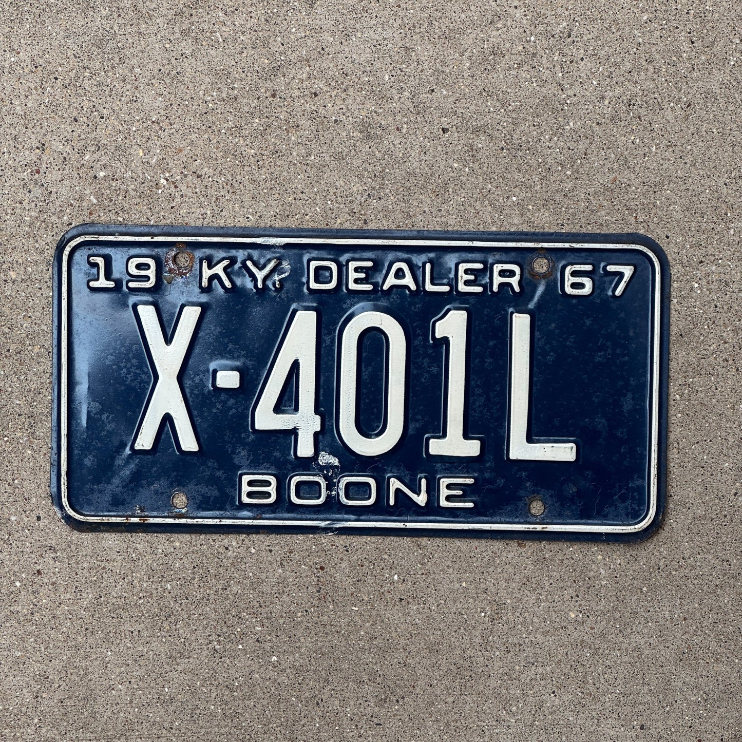 Photo of a 1967 Kentucky Dealer License Plate Auto Tag Garage Decor Vintage X 401 L