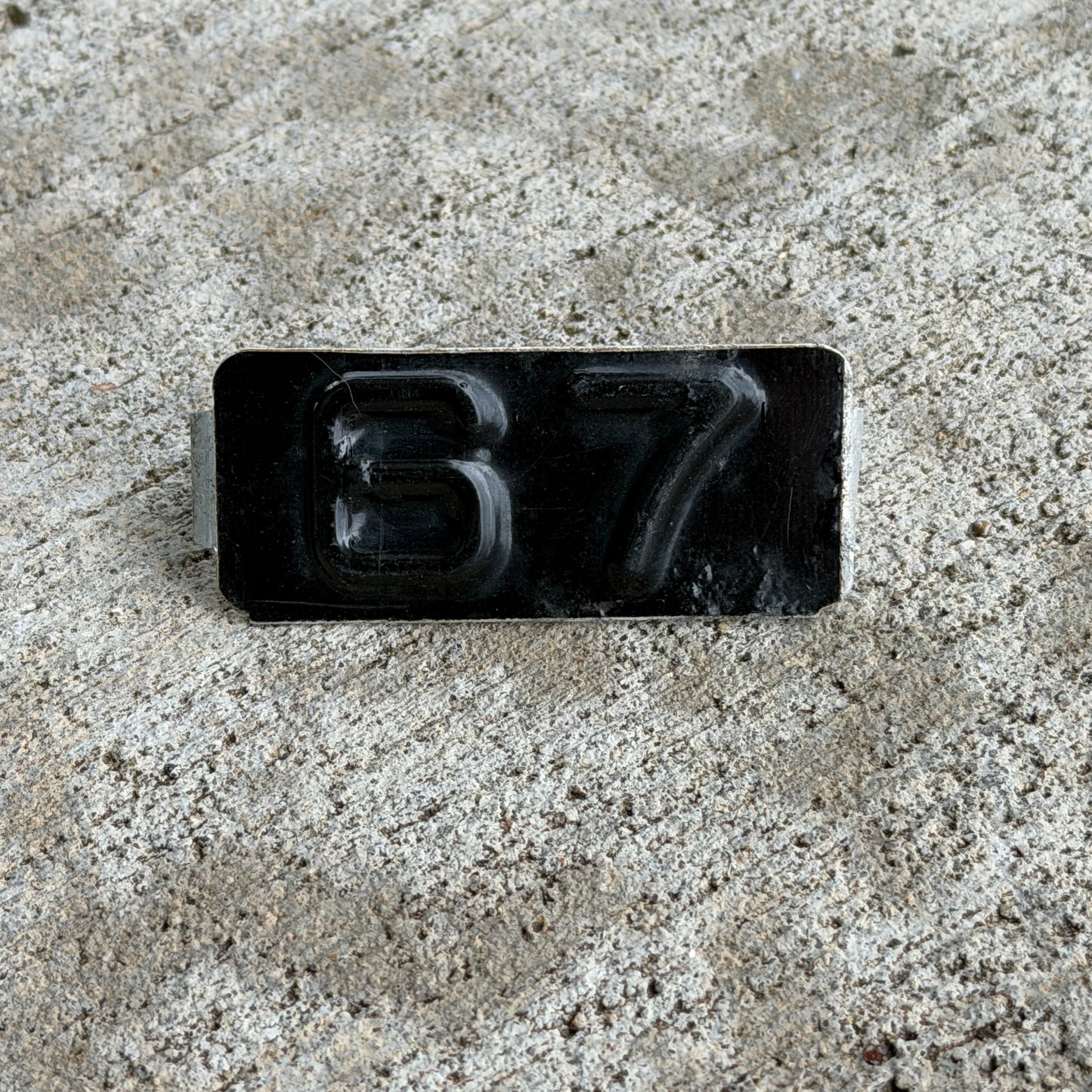 Photo of a 1967 Maine Tab License Plate Auto Tag 15 with original patina