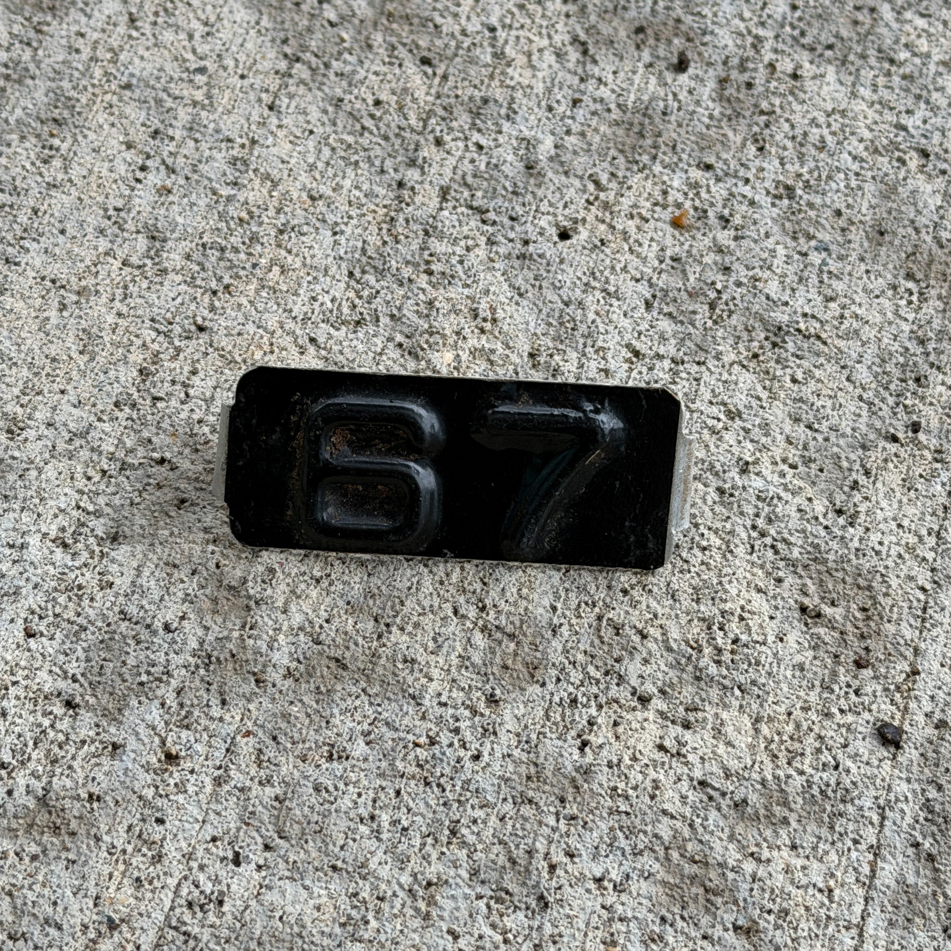 Photo of a 1967 Maine Tab License Plate Auto Tag Garage Decor Vintage with original patina