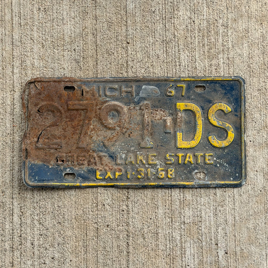 Photo of a 1967 Michigan Commercial License Plate Auto Tag Garage Decor Vintage 2791 DS with original patina