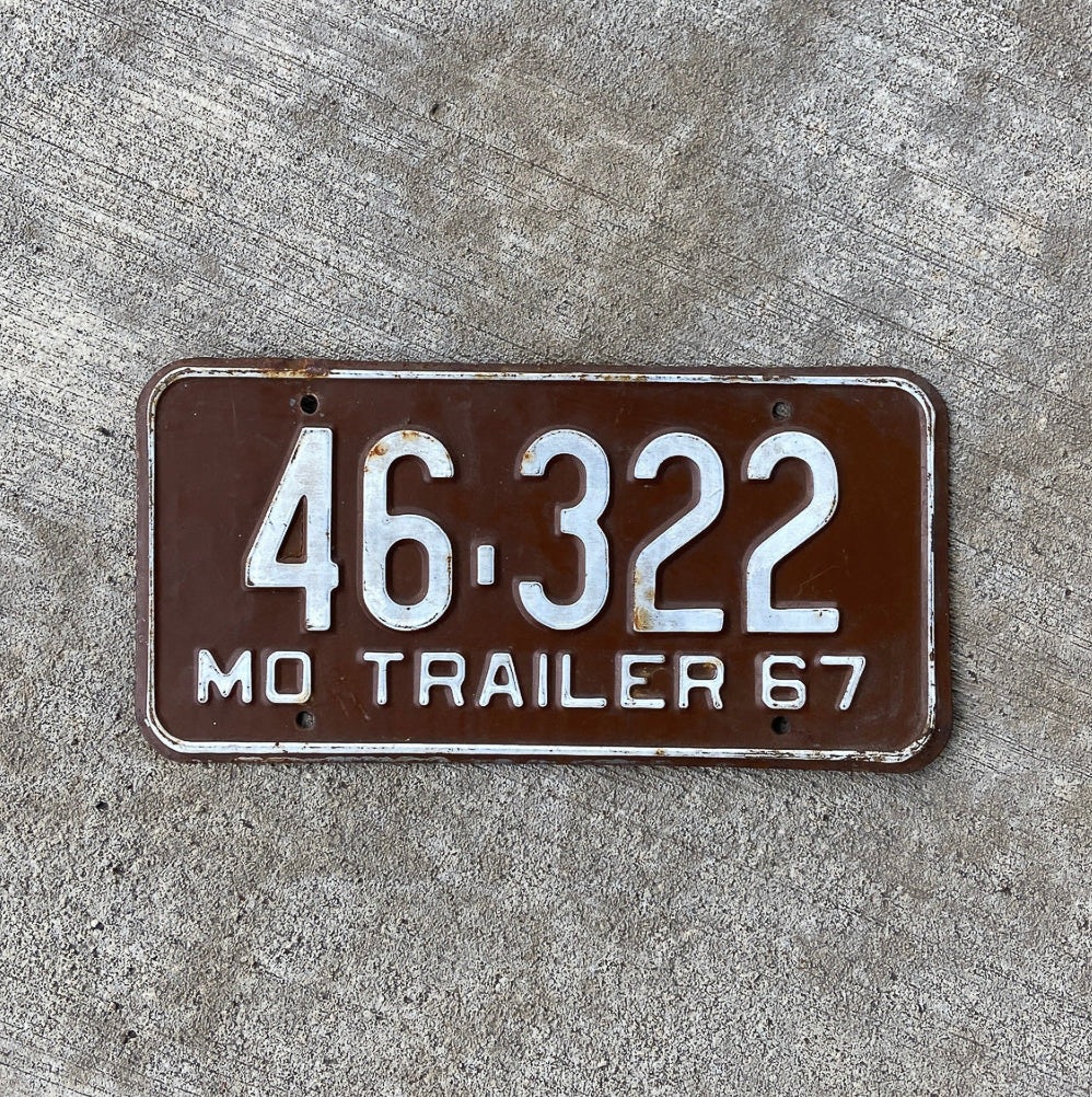 Photo of a 1967 Missouri Trailer License Plate Auto Tag Garage Decor Vintage 46 322 with original patina