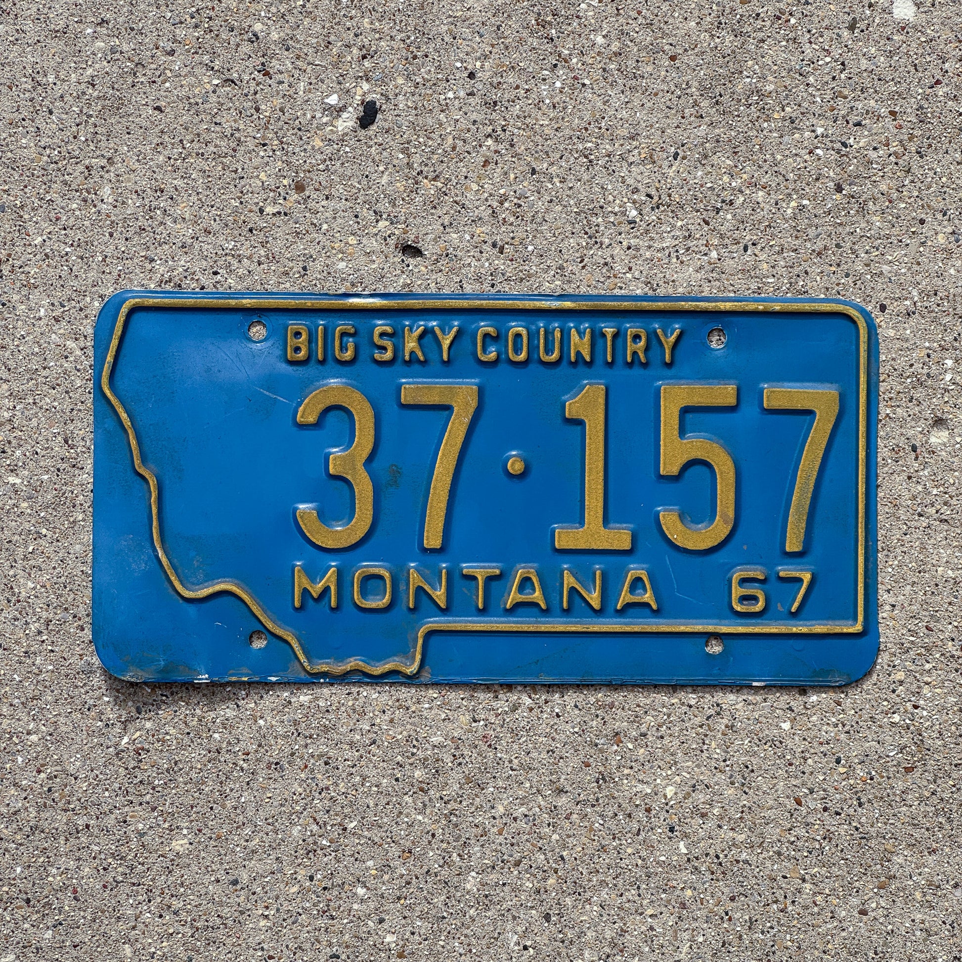 Photo of a 1967 Montana License Plate Auto Tag Garage Decor Vintage State Shape 37 157 with original patina
