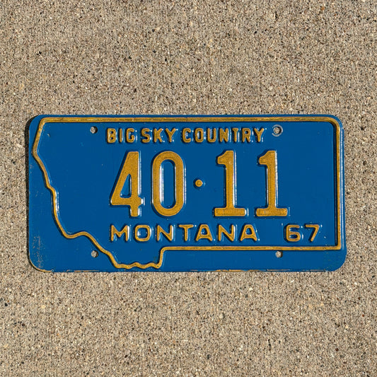 Photo of a 1967 Montana License Plate Auto Tag Garage Decor Vintage State Shape Low Number Two Digit Sweet Grass County 40 11 with original patina