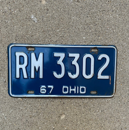 Photo of a 1967 Ohio License Plate Auto Tag Garage Decor Vintage RM 3302 with original patina
