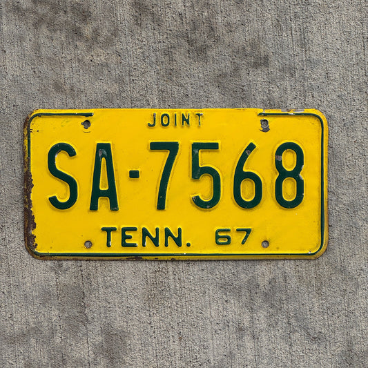 Photo of a 1967 Tennessee Joint Truck License Plate Auto Tag Garage Decor Vintage SA 7568 with original patina