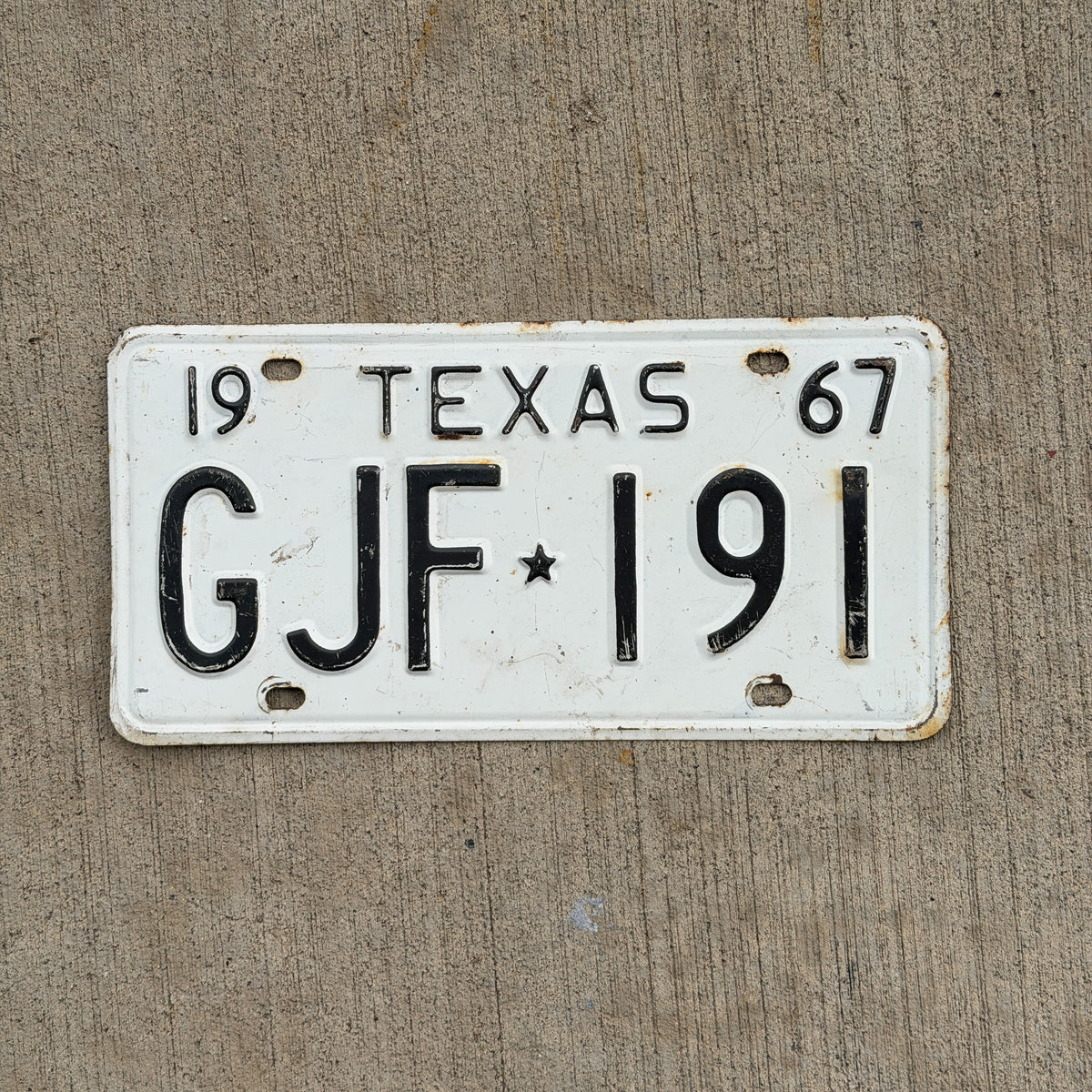 Photo of a 1967 Texas License Plate Auto Tag Garage Decor Vintage GJF 191 with original patina