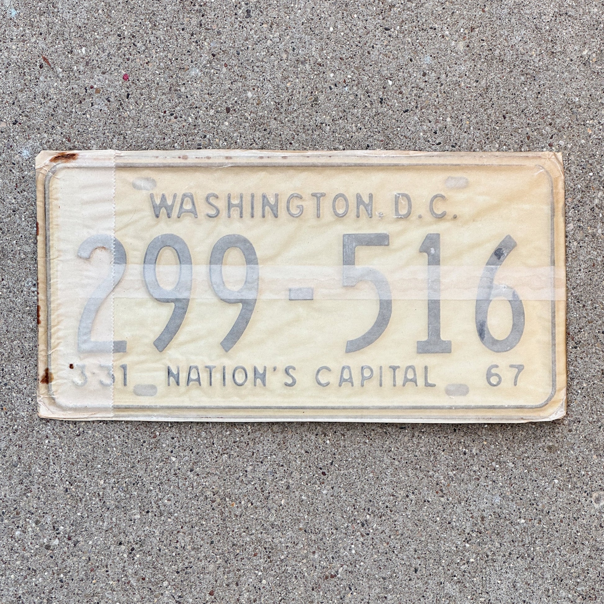 Photo of a 1967 Washington DC License Plate Pair Auto Tag Garage Decor Vintage with Envelope 299 516 with original patina