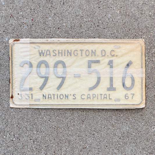 Photo of a 1967 Washington DC License Plate Pair Auto Tag Garage Decor Vintage with Envelope 299 516 with original patina