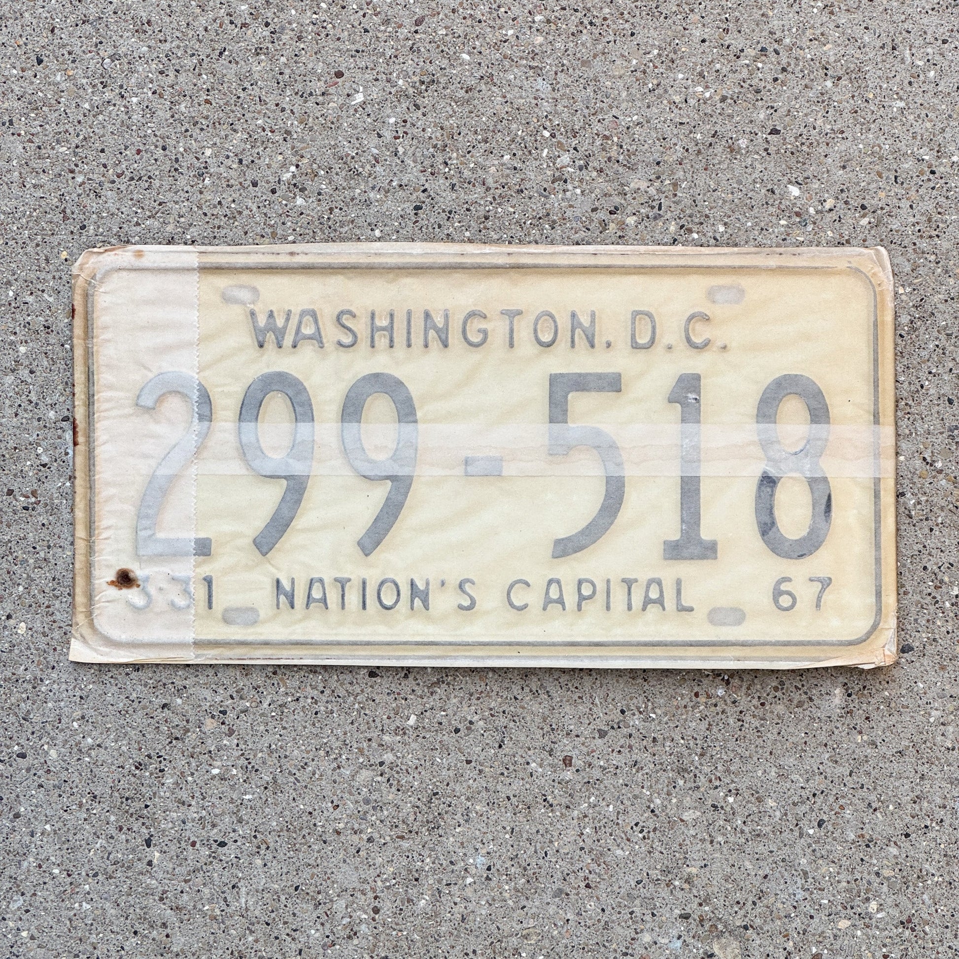 Photo of a 1967 Washington DC License Plate Pair Auto Tag Garage Decor Vintage with Envelope 299 518 with original patina