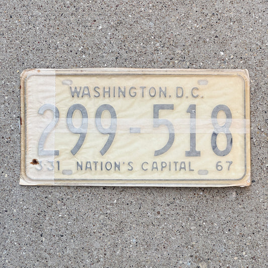 Photo of a 1967 Washington DC License Plate Pair Auto Tag Garage Decor Vintage with Envelope 299 518 with original patina