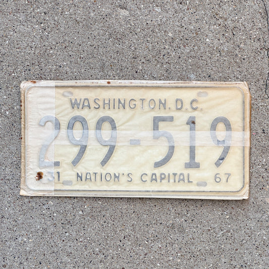 Photo of a 1967 Washington DC License Plate Pair Auto Tag Garage Decor Vintage with Envelope 299 519 with original patina