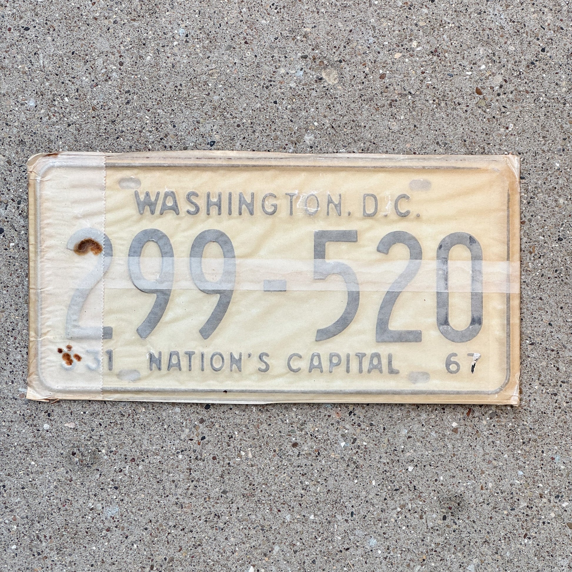 Photo of a 1967 Washington DC License Plate Pair Auto Tag Garage Decor Vintage with Envelope 299 520 with original patina