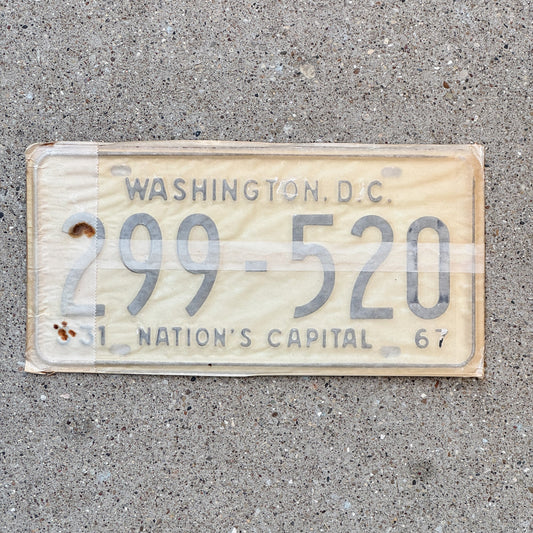 Photo of a 1967 Washington DC License Plate Pair Auto Tag Garage Decor Vintage with Envelope 299 520 with original patina