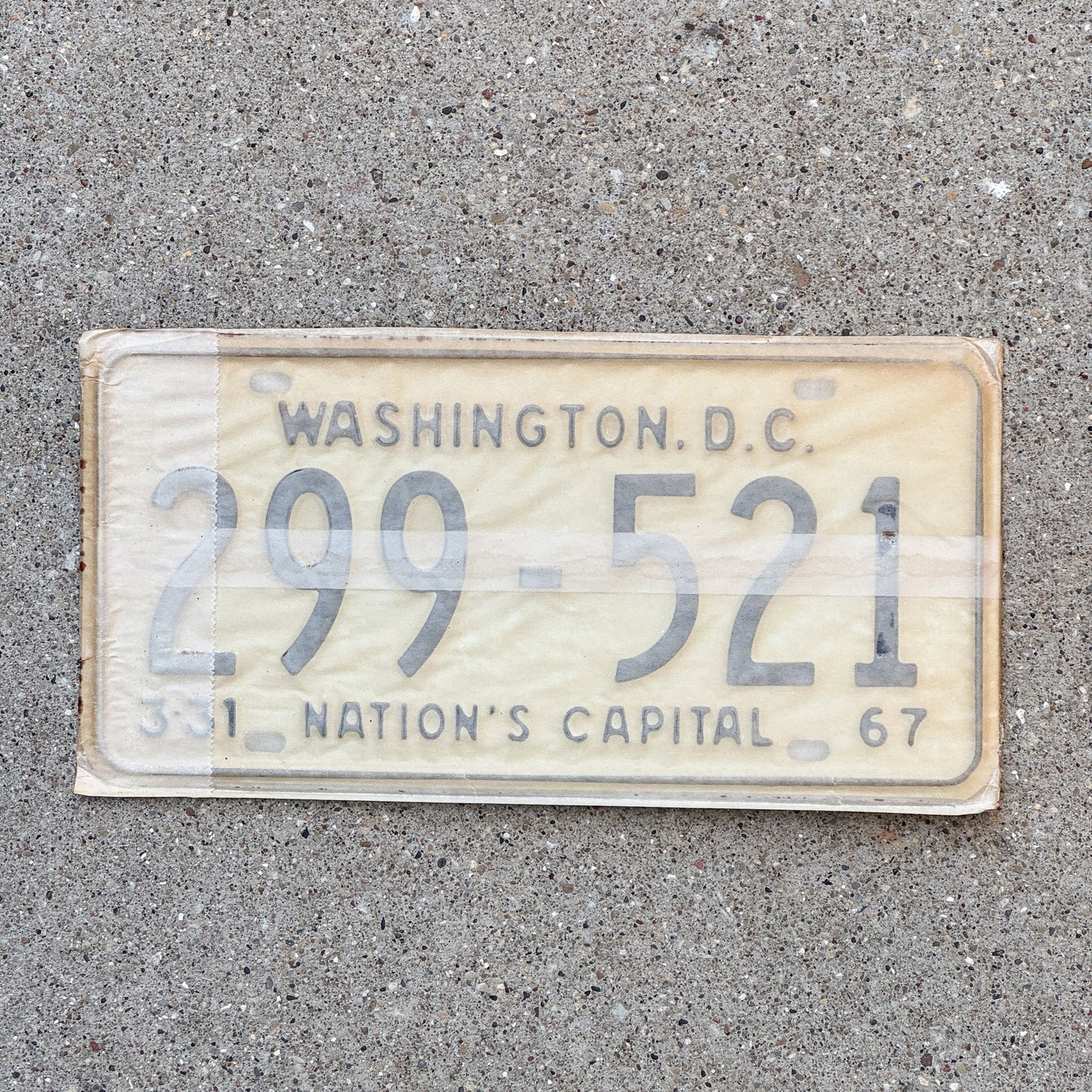 Photo of a 1967 Washington DC License Plate Pair Auto Tag Garage Decor Vintage with Envelope 299 521 with original patina