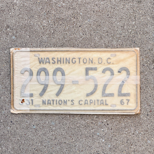 Photo of a 1967 Washington DC License Plate Pair Auto Tag Garage Decor Vintage with Envelope 299 522 with original patina