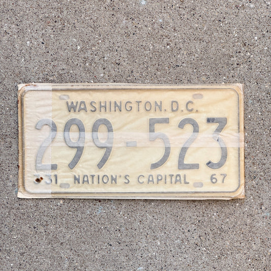 Photo of a 1967 Washington DC License Plate Pair Auto Tag Garage Decor Vintage with Envelope 299 523 with original patina