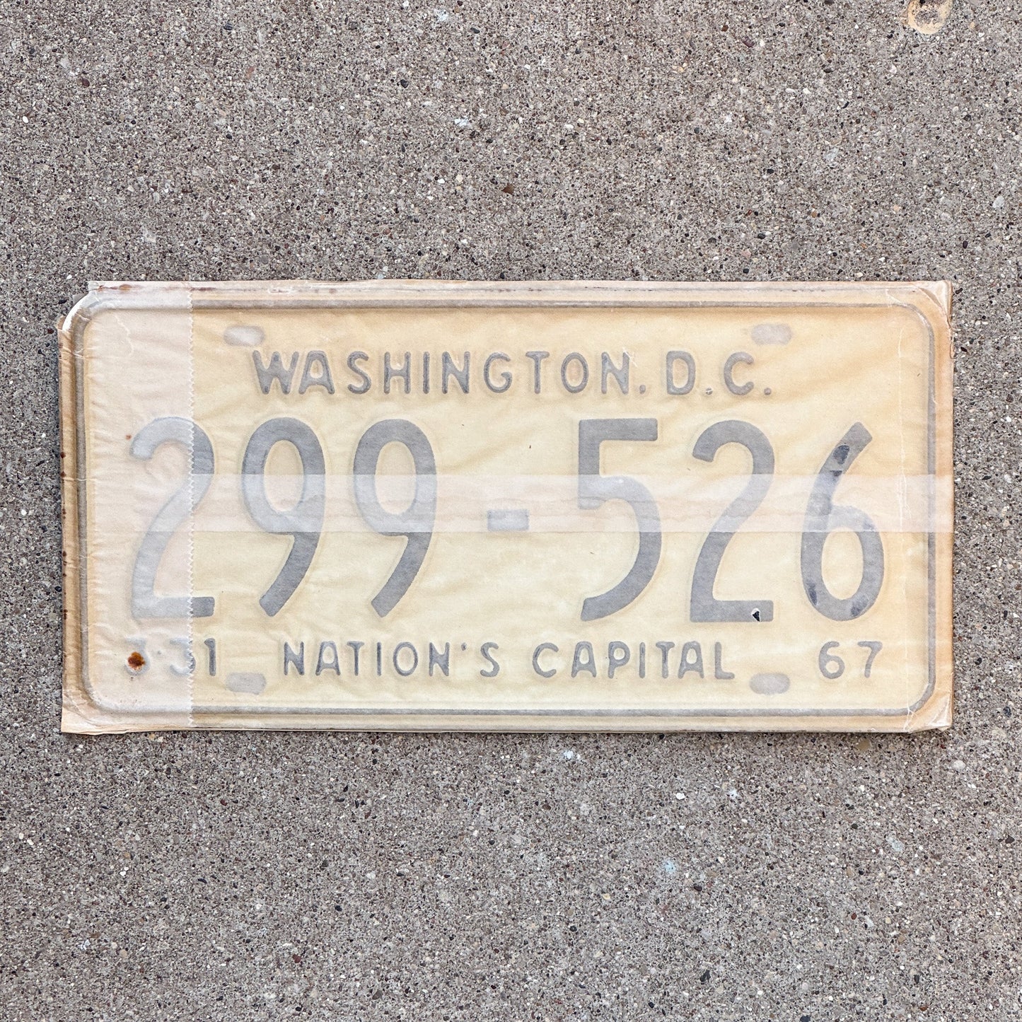 Photo of a 1967 Washington DC License Plate Pair Auto Tag Garage Decor Vintage with Envelope 299 526 with original patina