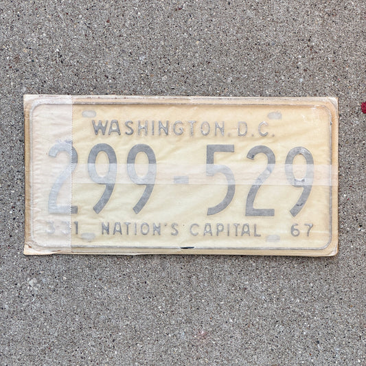 Photo of a 1967 Washington DC License Plate Pair Auto Tag Garage Decor Vintage with Envelope 299 529 with original patina