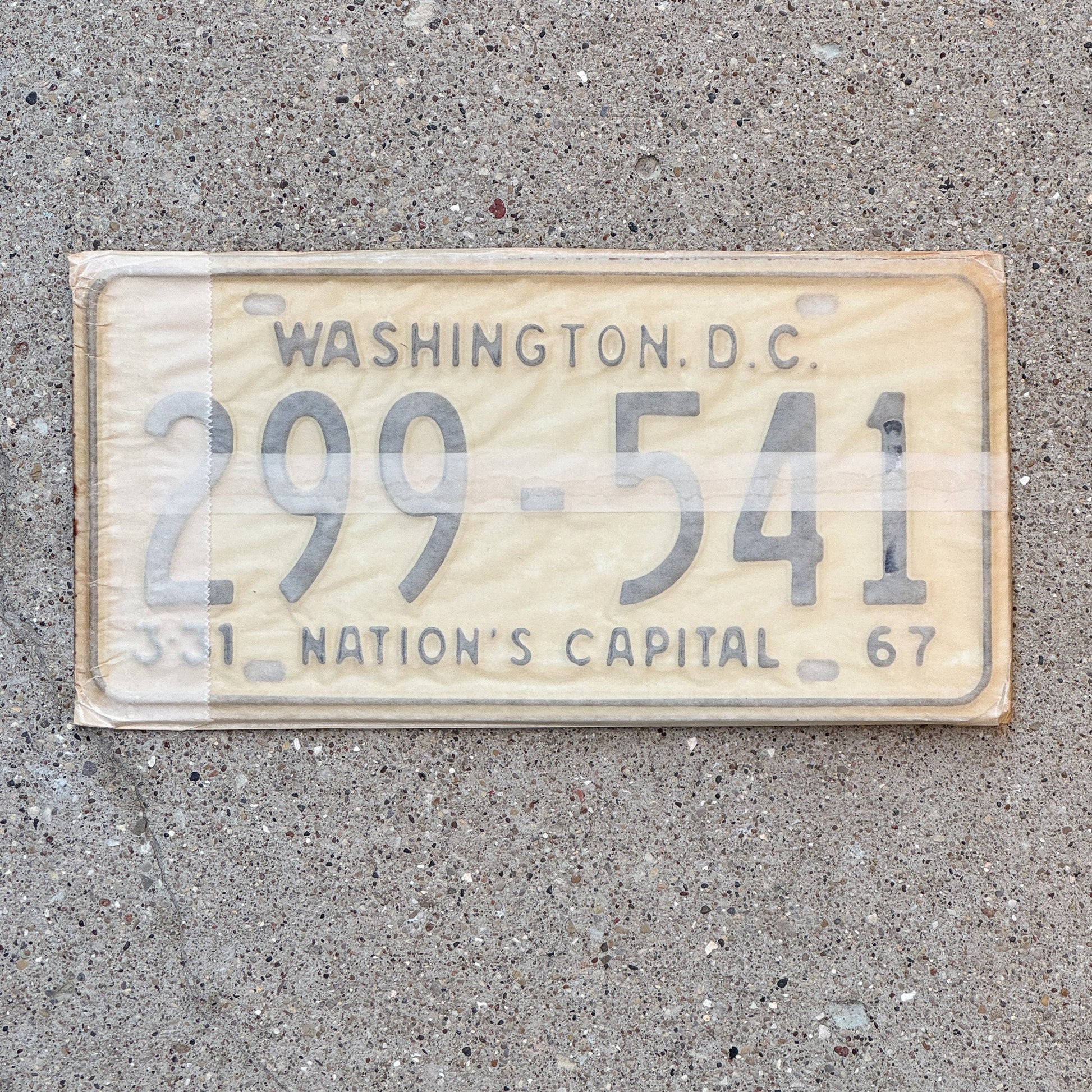 Photo of a 1967 Washington DC License Plate Pair Auto Tag Garage Decor Vintage with Envelope 299 541 with original patina