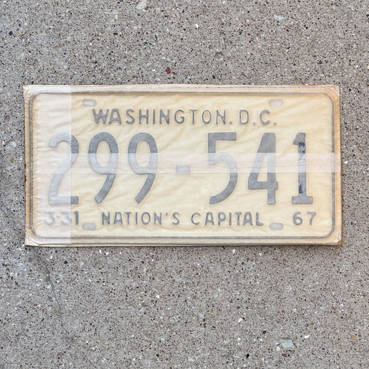 Photo of a 1967 Washington DC License Plate Pair Auto Tag Garage Decor Vintage with Envelope 299 541 with original patina