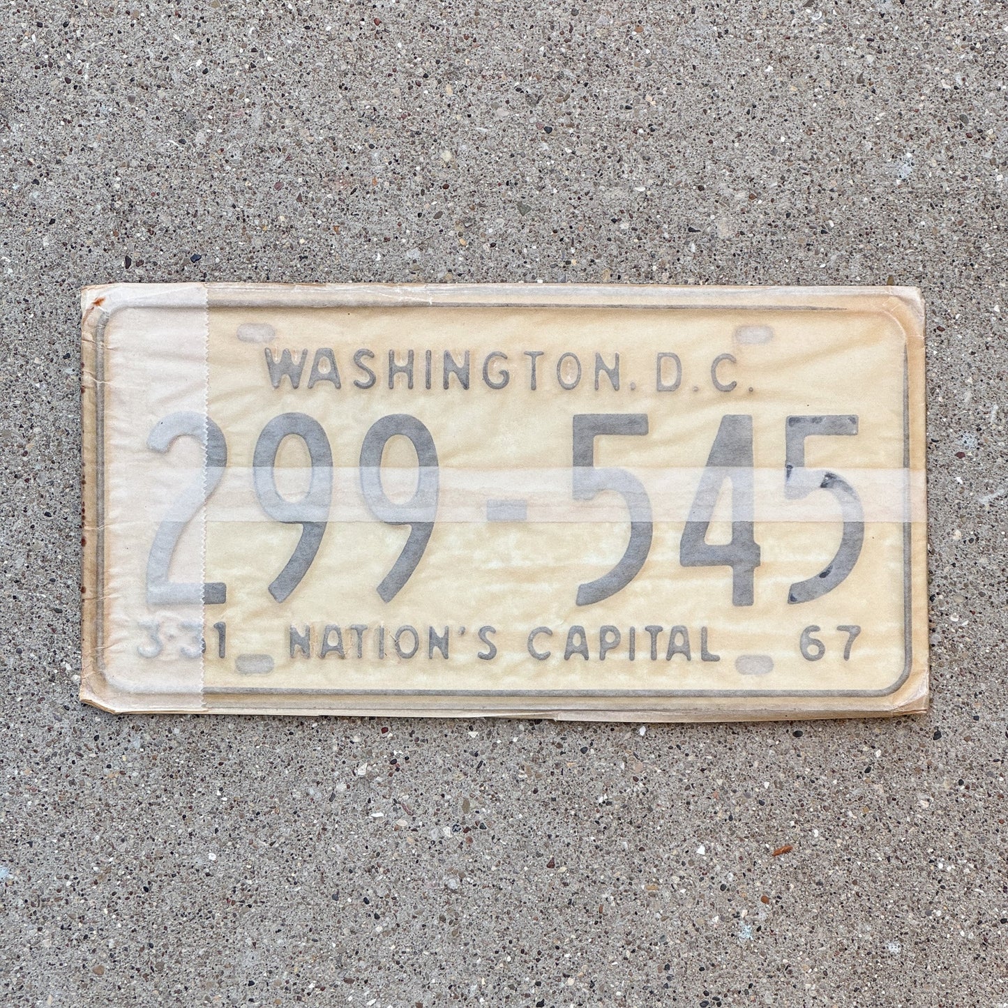 Photo of a 1967 Washington DC License Plate Pair Auto Tag Garage Decor Vintage with Envelope 299 545 with original patina