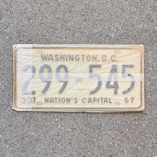 Photo of a 1967 Washington DC License Plate Pair Auto Tag Garage Decor Vintage with Envelope 299 545 with original patina