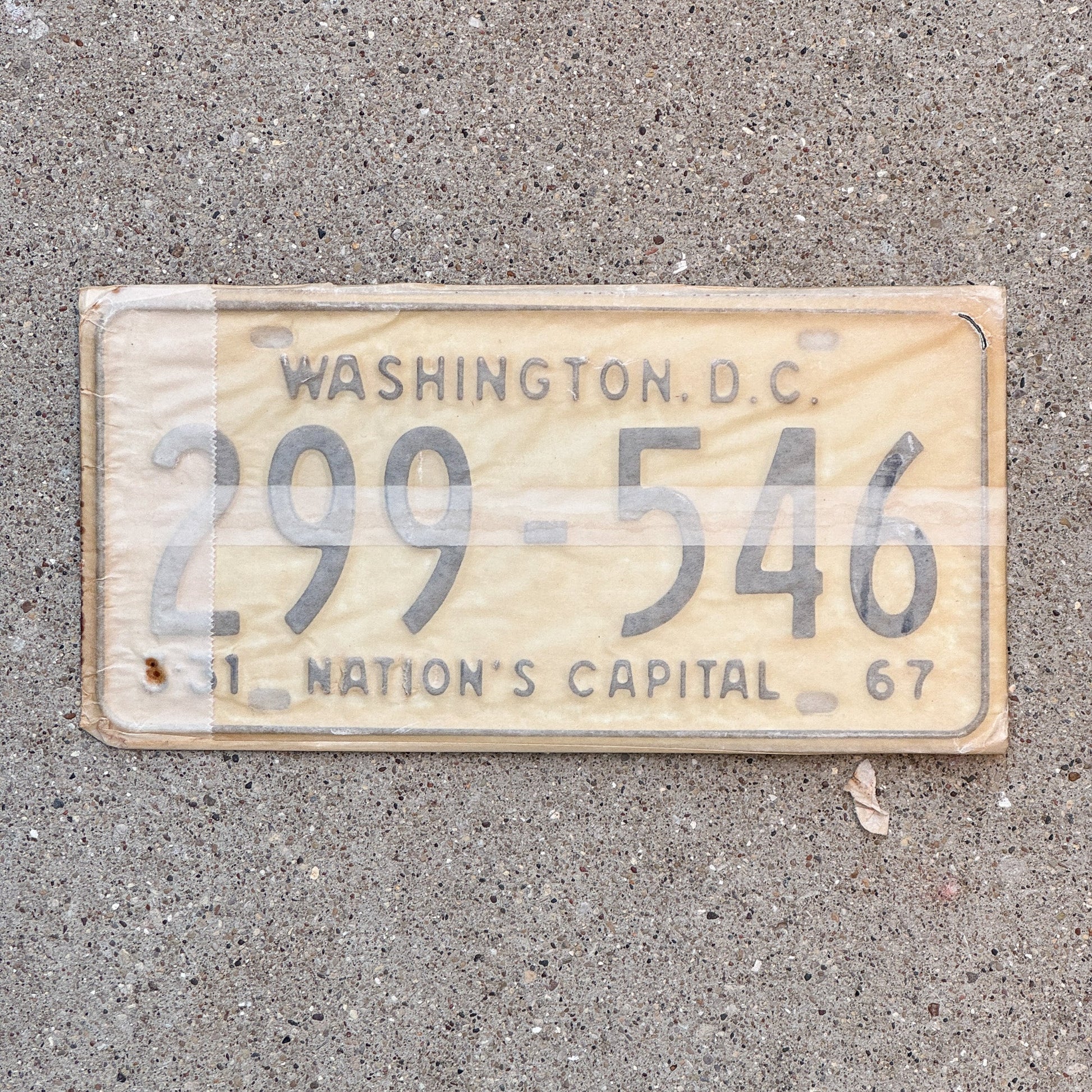 Photo of a 1967 Washington DC License Plate Pair Auto Tag Garage Decor Vintage with Envelope 299 546 with original patina