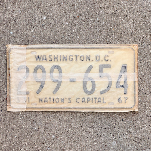 Photo of a 1967 Washington DC License Plate Pair Auto Tag Garage Decor Vintage with Envelope 299 654 with original patina