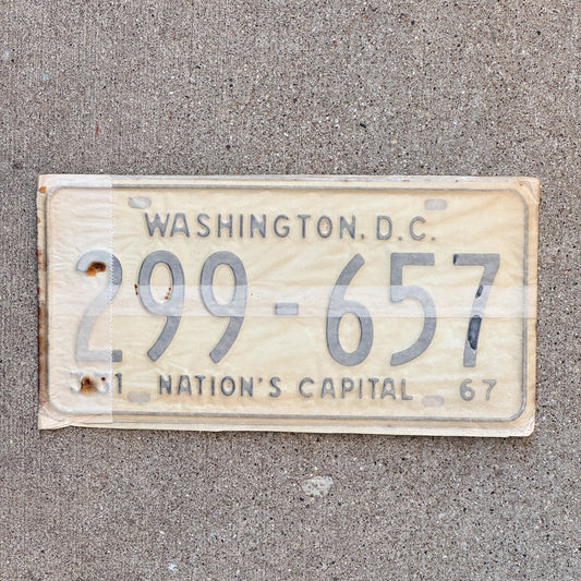 Photo of a 1967 Washington DC License Plate Pair Auto Tag Garage Decor Vintage with Envelope 299 657 with original patina
