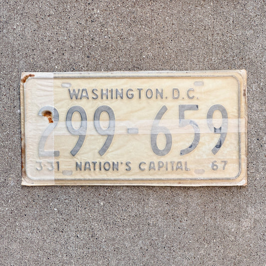 Photo of a 1967 Washington DC License Plate Pair Auto Tag Garage Decor Vintage with Envelope 299 659 with original patina