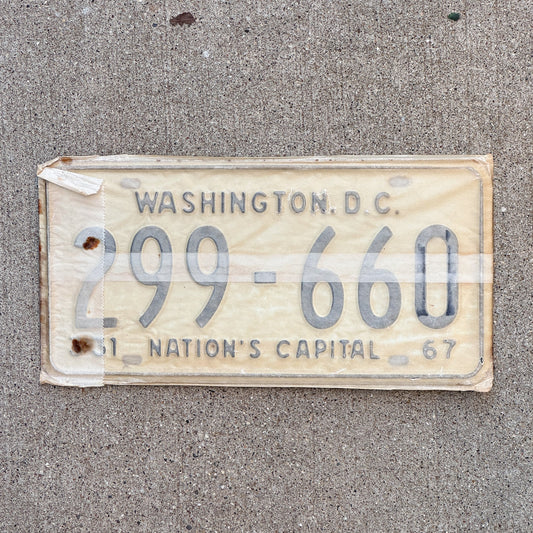 Photo of a 1967 Washington DC License Plate Pair Auto Tag Garage Decor Vintage with Envelope 299 660 with original patina