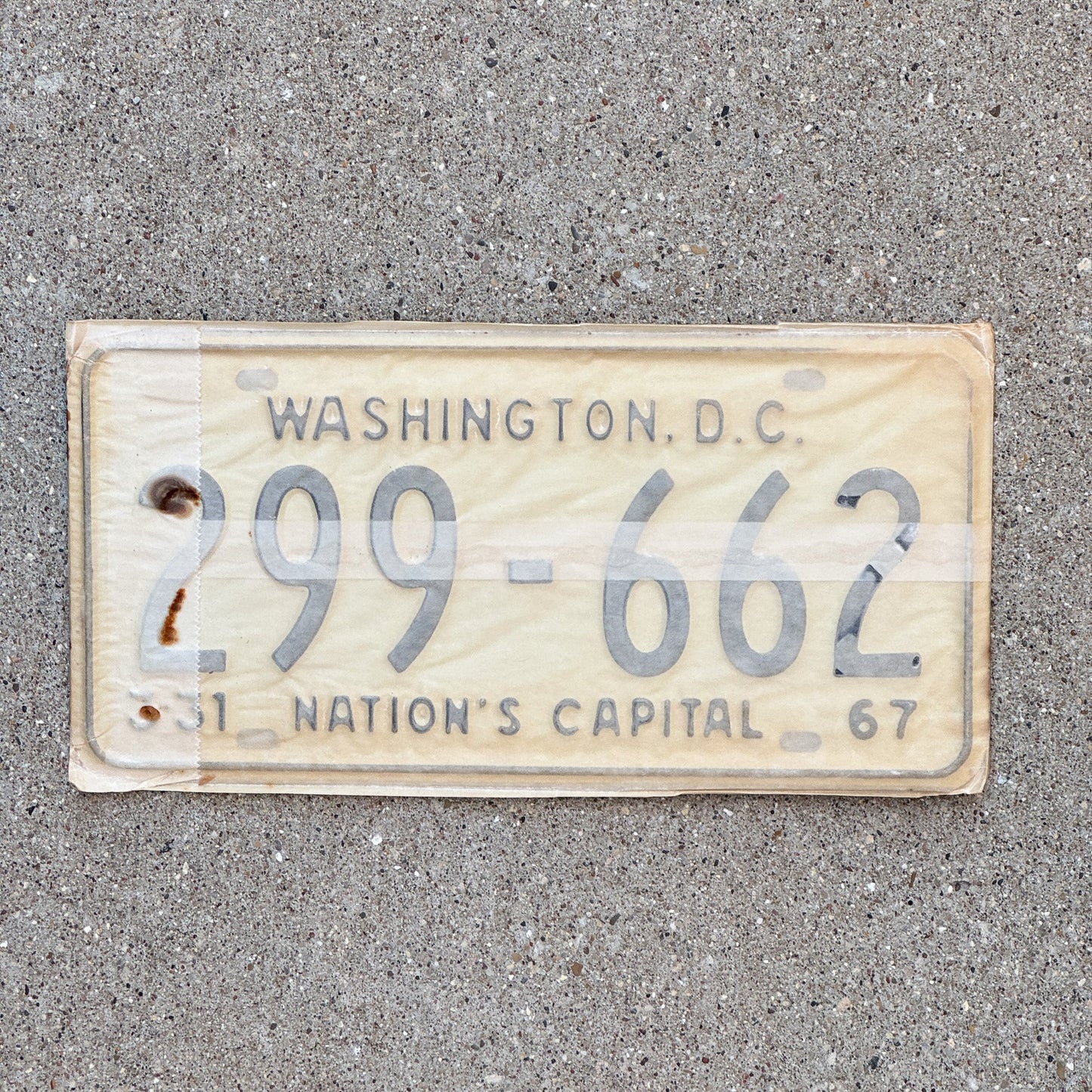 Photo of a 1967 Washington DC License Plate Pair Auto Tag Garage Decor Vintage with Envelope 299 662 with original patina