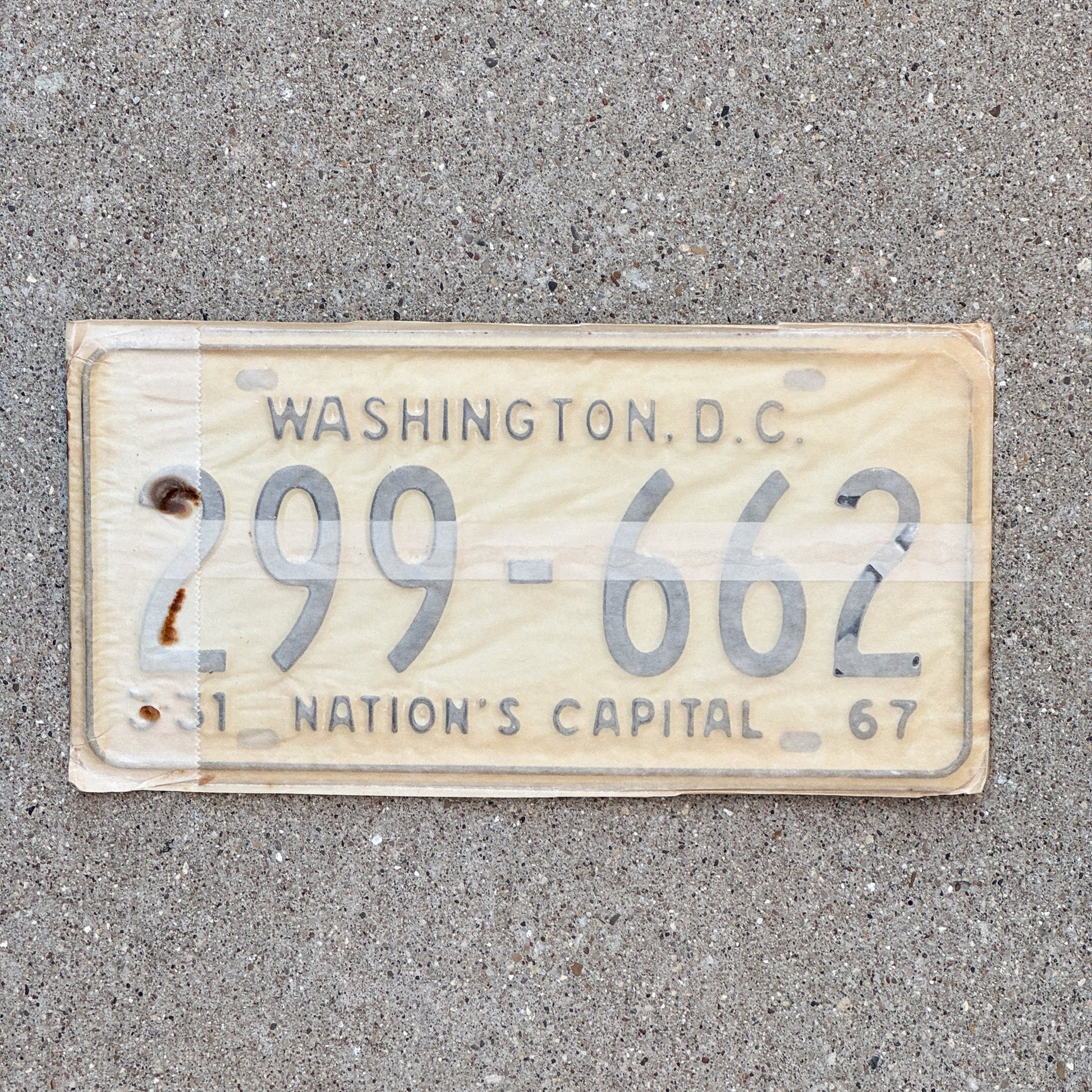 Photo of a 1967 Washington DC License Plate Pair Auto Tag Garage Decor Vintage with Envelope 299 662 with original patina