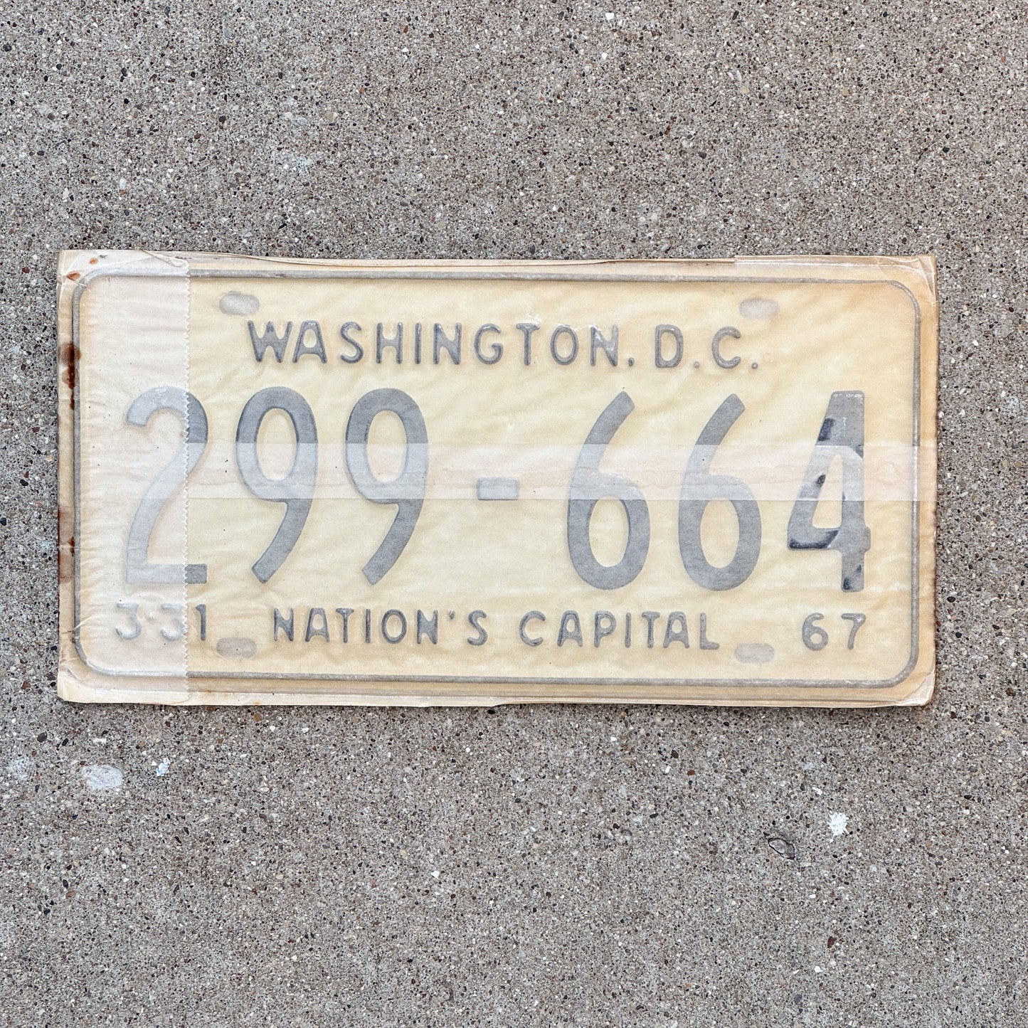 Photo of a 1967 Washington DC License Plate Pair Auto Tag Garage Decor Vintage with Envelope 299 664 with original patina