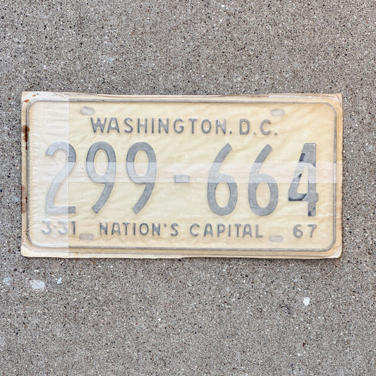 Photo of a 1967 Washington DC License Plate Pair Auto Tag Garage Decor Vintage with Envelope 299 664 with original patina