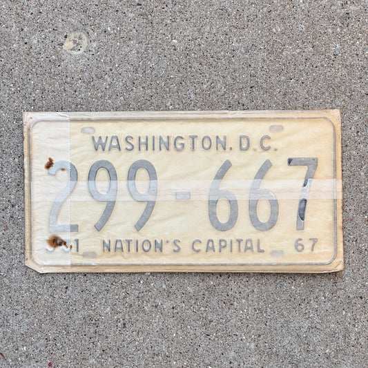 Photo of a 1967 Washington DC License Plate Pair Auto Tag Garage Decor Vintage with Envelope 299 667 with original patina