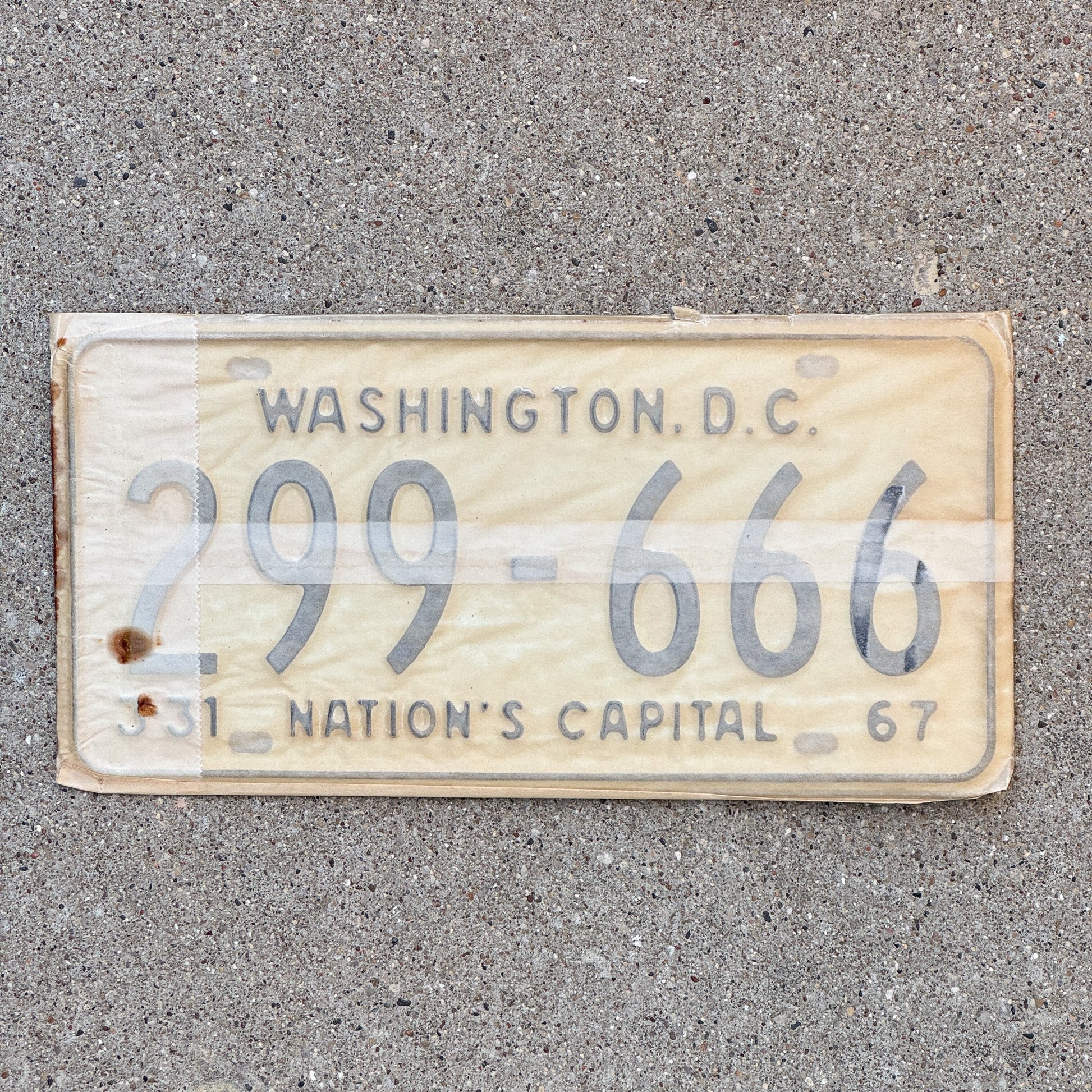 Photo of a 1967 Washington DC License Plate Pair Auto Tag Garage Decor Vintage with Envelope Devil Evil 666 Repeat Repeating 299 666 with original patina