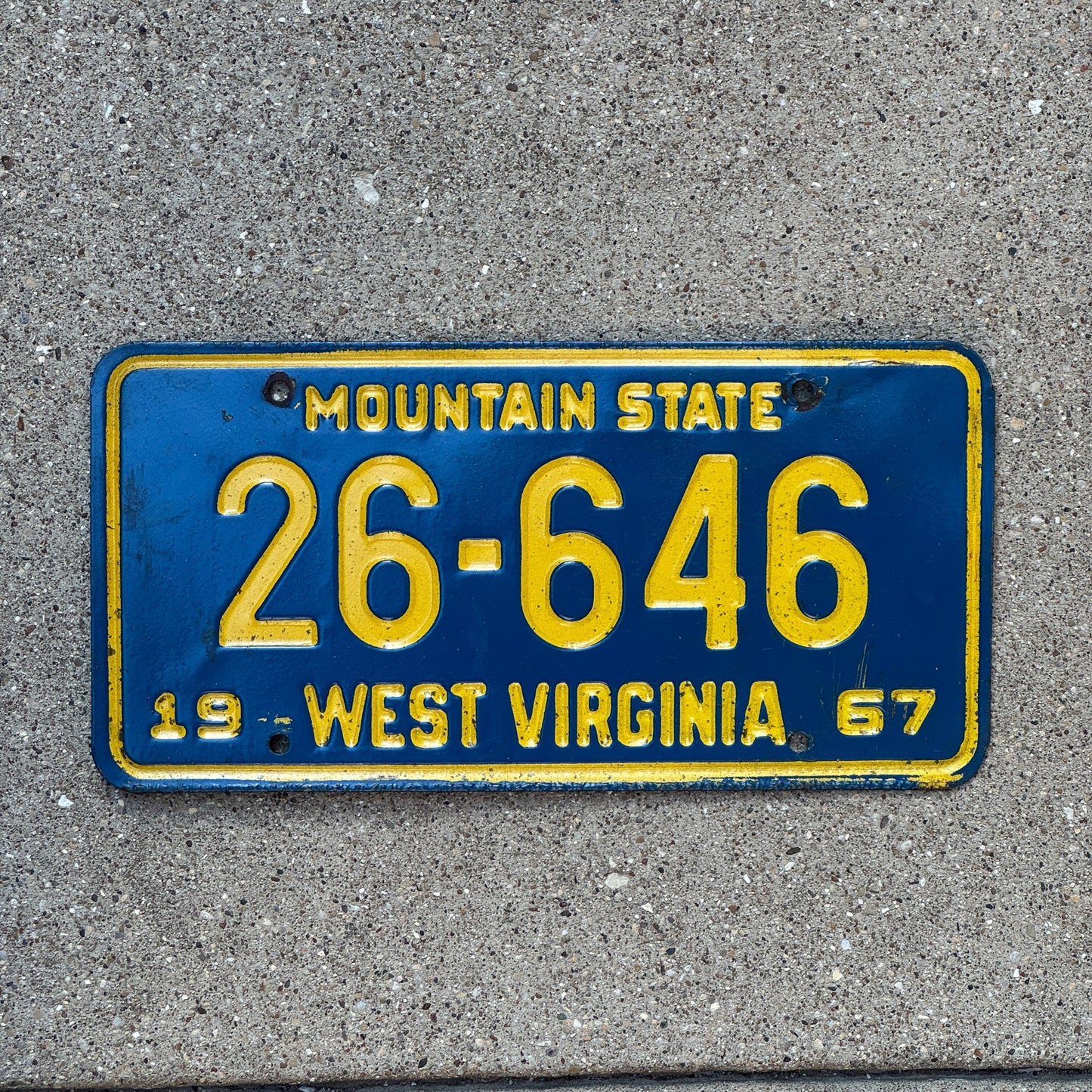 Photo of a 1967 West Virginia License Plate Auto Tag Garage Decor Vintage 26 646