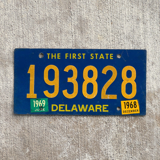 Photo of a 1968 1969 Delaware License Plate Auto Tag Garage Decor Vintage Riveted Numbers 193828 with original patina