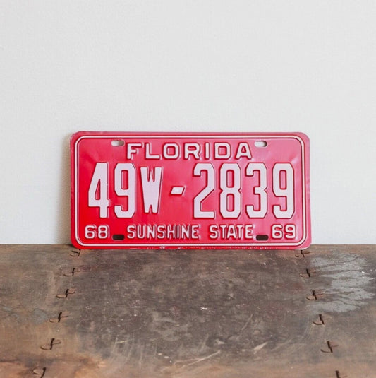 Photo of a 1968 1969 Florida License Plate Auto Tag Garage Decor Vintage New Old Stock High Quality Hendry County 49W 2839 with original patina
