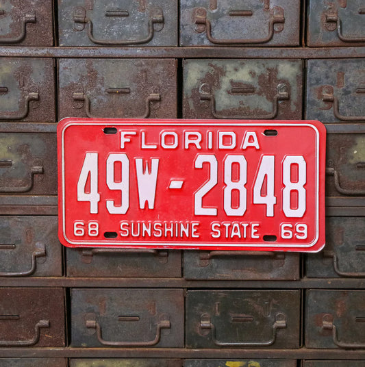 Photo of a 1968 1969 Florida License Plate Vintage Auto Tag Garage New Old Stock High Quality Hendry County 49W 2848 with original patina