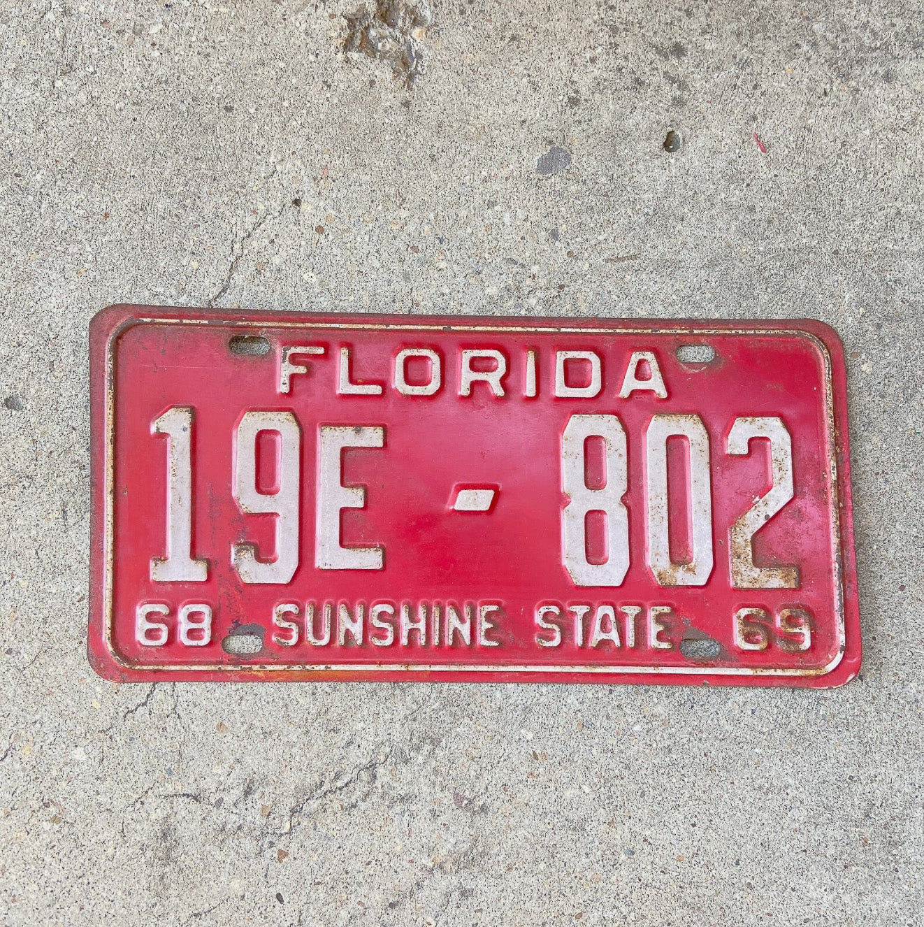 Photo of a 1968 1969 Florida Limo License Plate Auto Tag Garage Decor Vintage Brevard County 19 E 802 with original patina