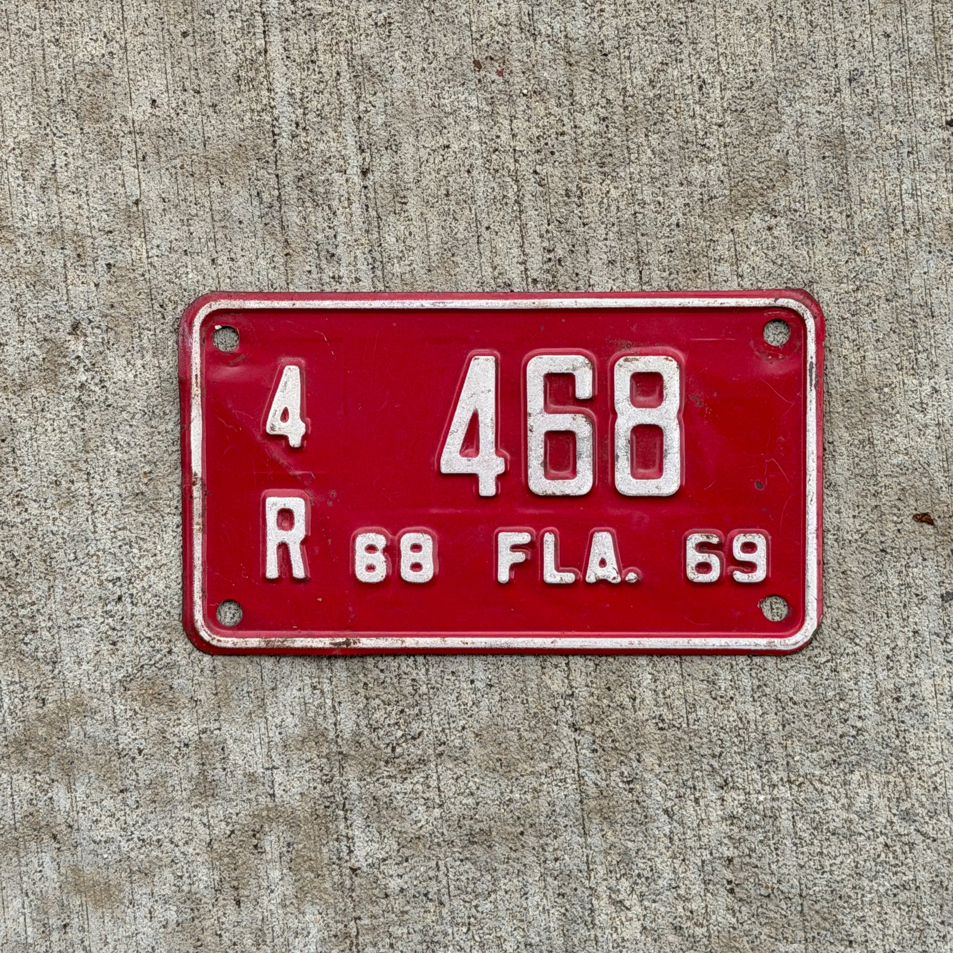 Photo of a 1968 1969 Florida Motorcycle License Plate Auto Tag Garage Decor Vintage 4 R 468 with original patina