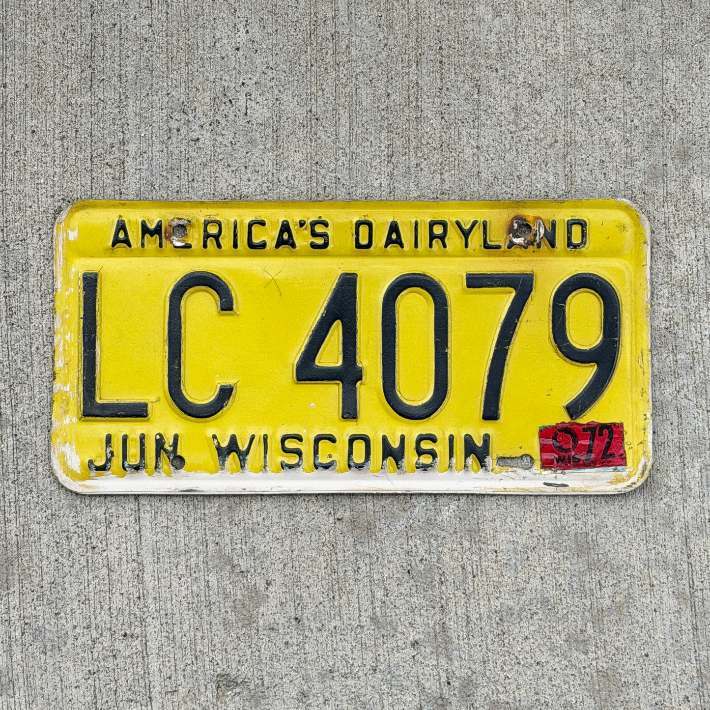 Photo of a 1968 1972 Wisconsin License Plate Auto Tag Garage Decor Vintage LC 4079 with original patina