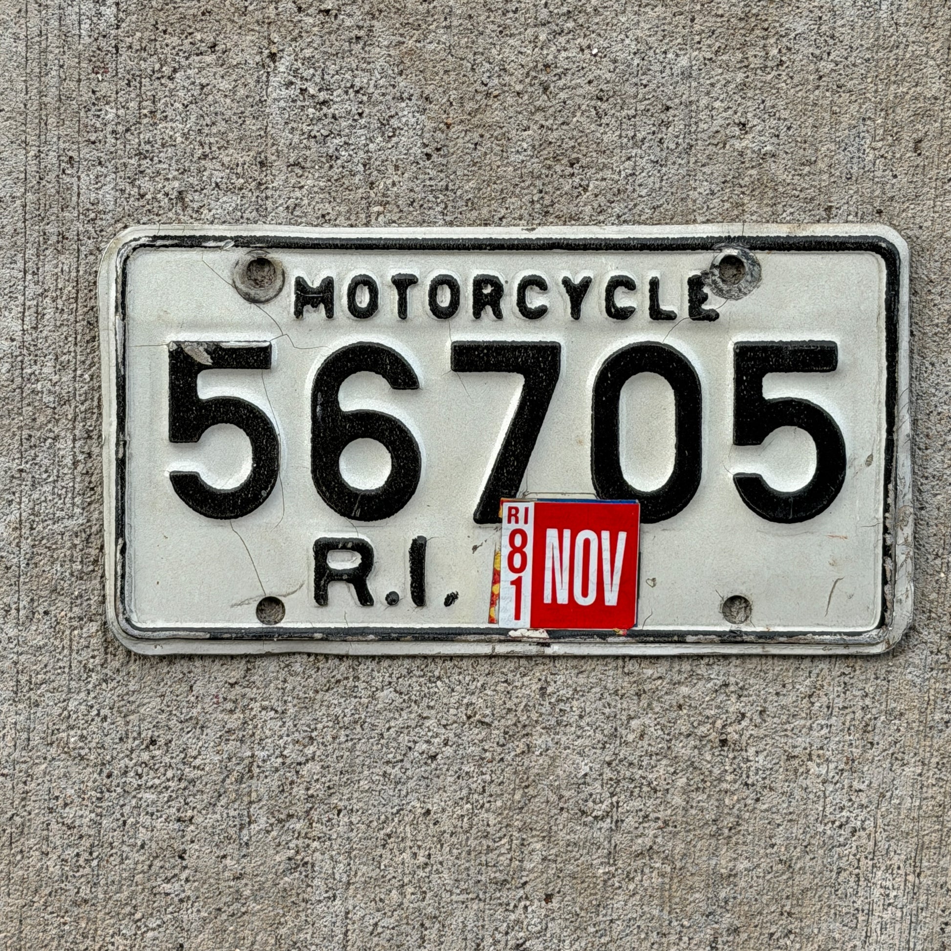 Photo of a 1968 1981 Rhode Island Motorcycle License Plate Auto Tag Garage Decor Vintage 56705 with original patina