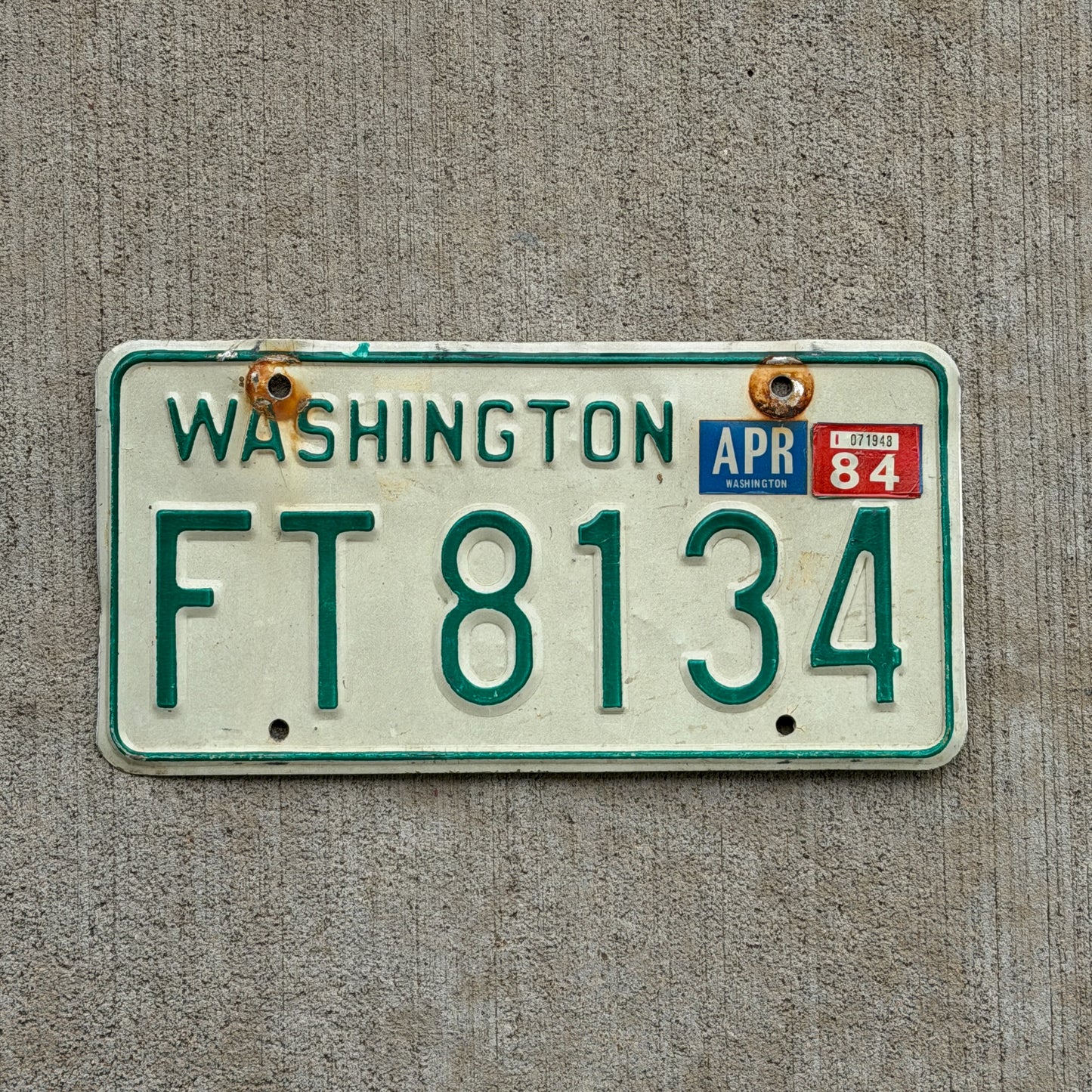 Photo of a 1968 1984 Washington Trailer License Plate Auto Tag Garage Decor Vintage FT 8134 with original patina
