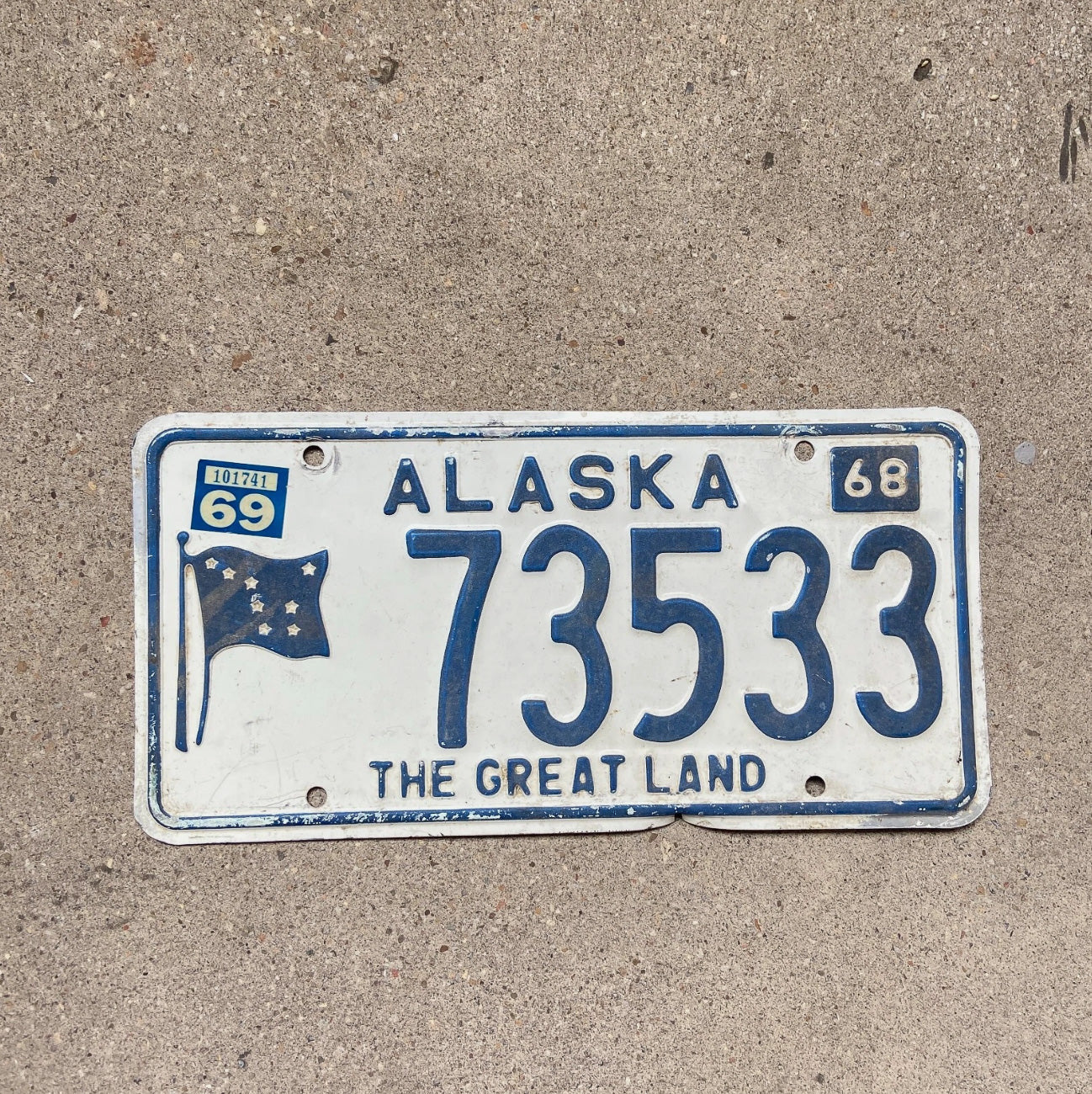 Photo of a 1968 Alaska License Plate Auto Tag Garage Decor Vintage Flag The Great Land 73533 with original patina