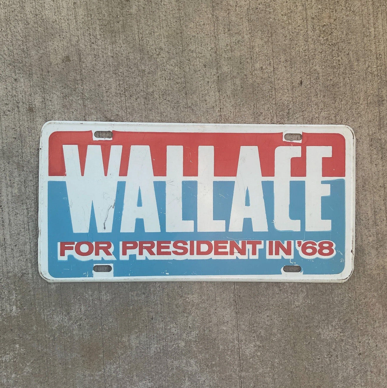Photo of a 1968 Election Wallace Booster License Plate Auto Tag Garage Decor Vintage Political President Presidential with original patina