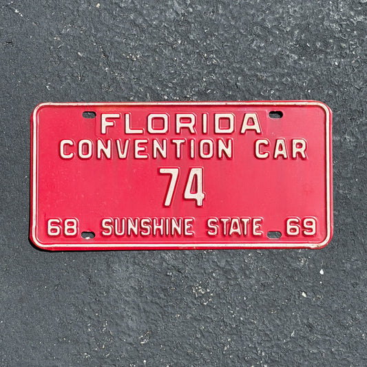 Photo of a 1968 Florida Convention Car License Plate Auto Tag Garage Decor Vintage 74 with original patina